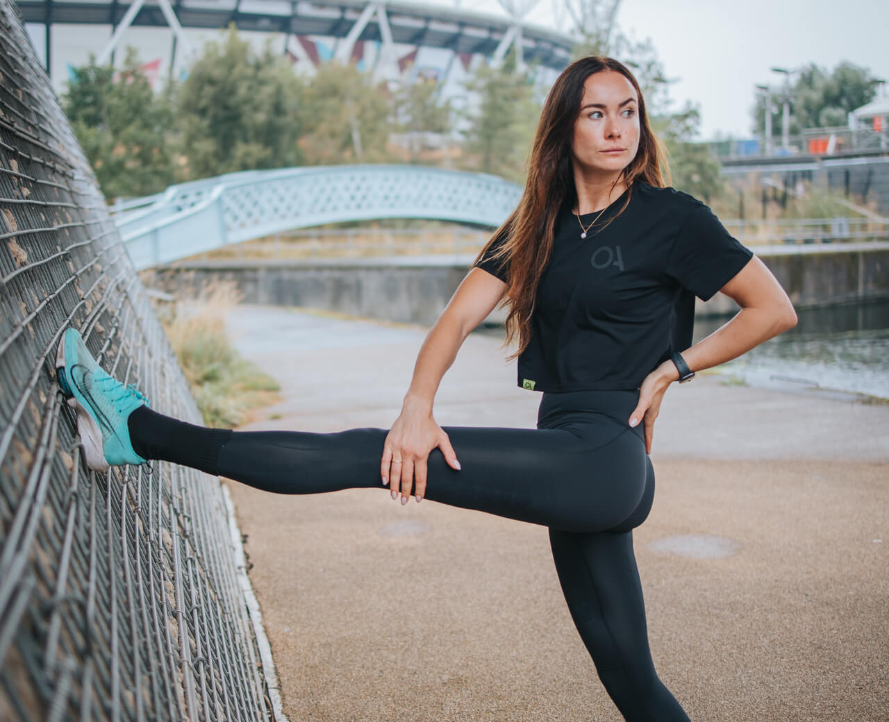 Over-Above-woman-stretching-leggings-carousel-size